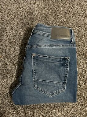 Departwest Men’s Slim Straight Jeans in Medium Blue